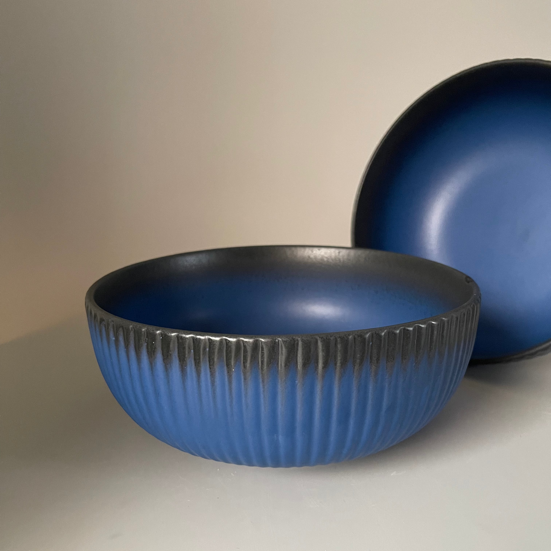 8.5-inch ceramic serve bowl with ribbed exterior and dual black-blue tones, perfect for sabzis, pulao, and cozy Indian meals