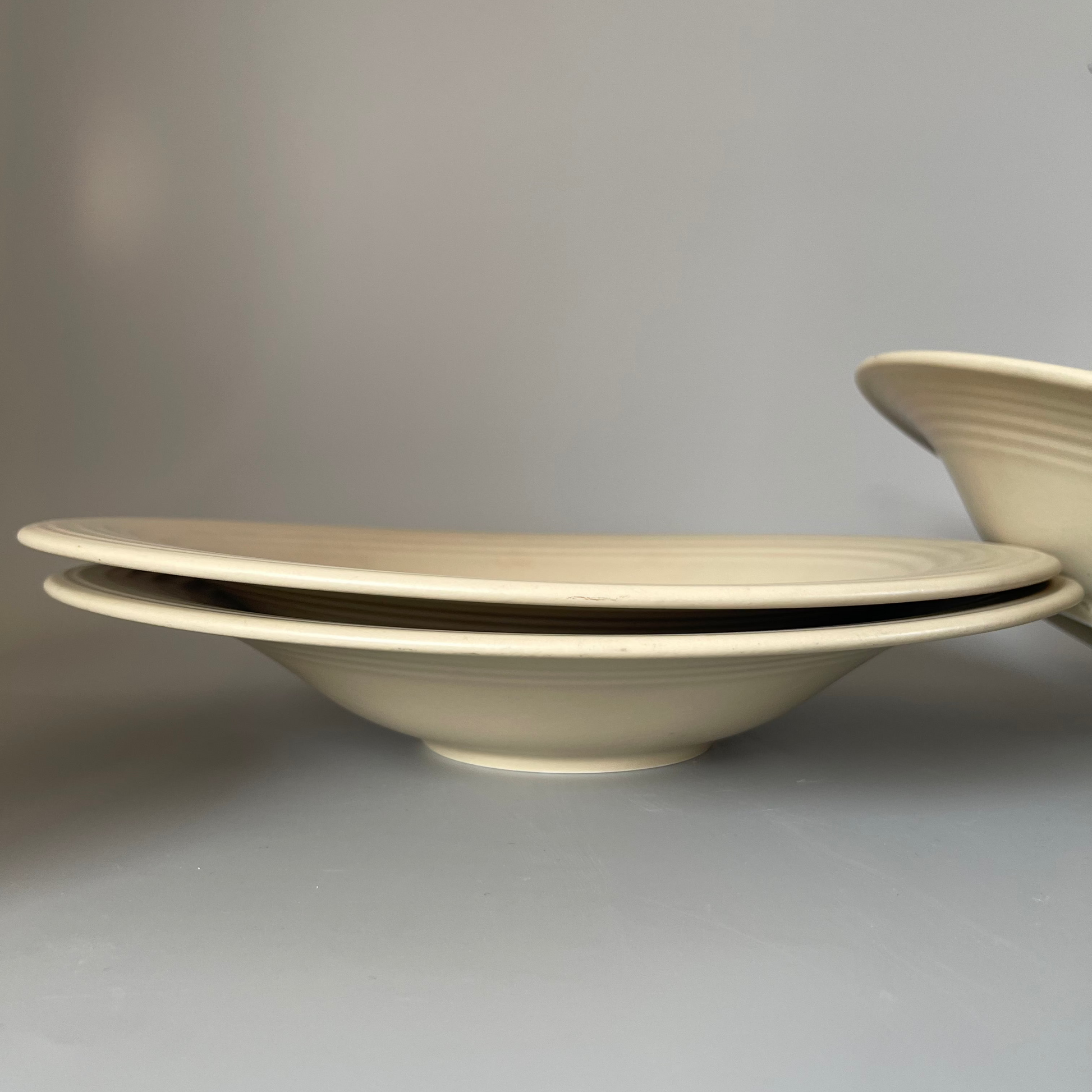 Single sculpted oval beige ceramic appetiser plate – elegant and minimal design for artful food presentation